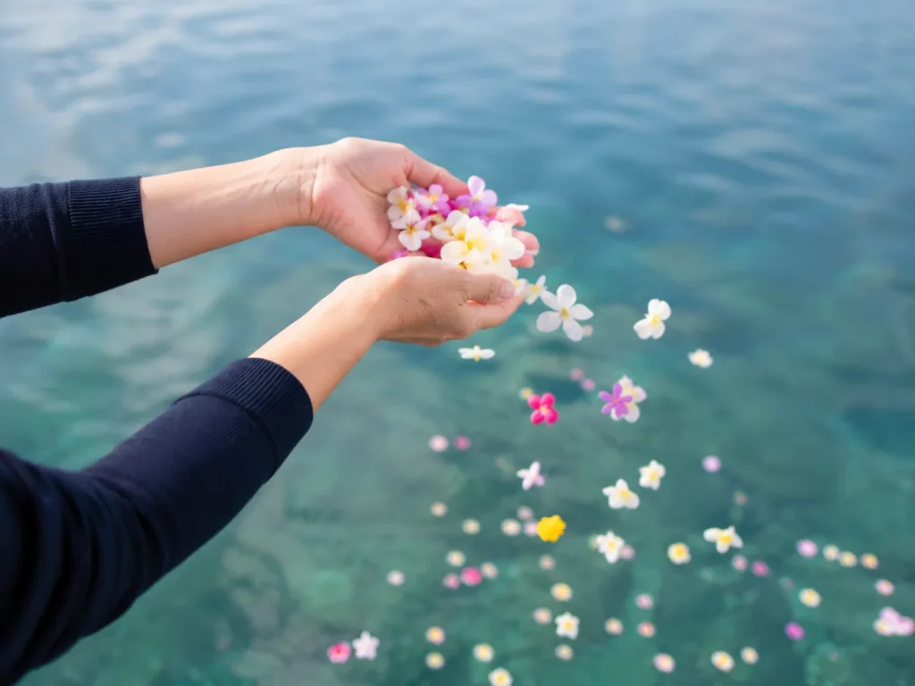 海へ花を手向ける様子